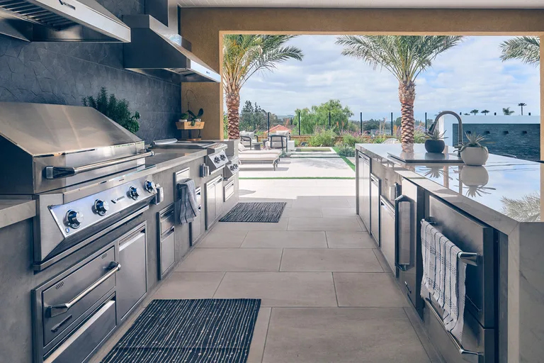 Built-in stainless steel grill in a Twin Eagles outdoor kitchen